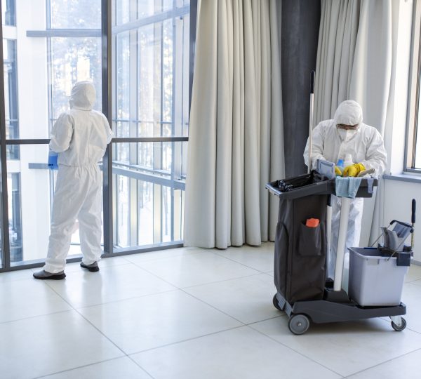 full-shot-people-hazmat-suit-cleaning